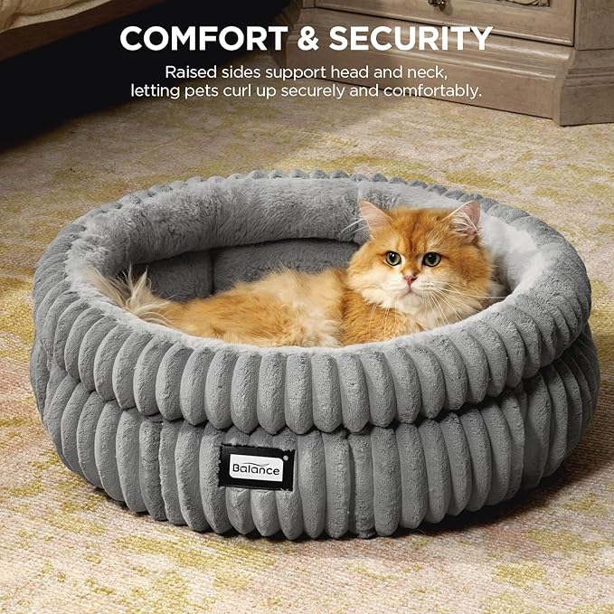 Soft faux fur cat bed with raised edges for comfort